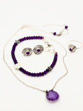 Spiral earrings with rose-cut Amethysts
